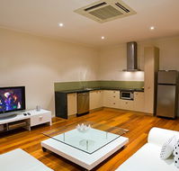 Indulge Apartments - QLD Tourism
