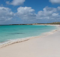 Pink Lake and Abrolhos Full Day Fly and Flipper - QLD Tourism