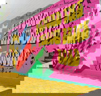 Yellow Brick Road and Elton John Mural - QLD Tourism