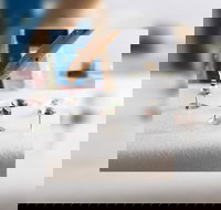 Grab a glass of wine and learn to make Resin Earrings - Queensland Tourism