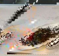 Mickeyccino Tea  Coffee House - Queensland Tourism