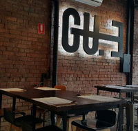 Gu.E