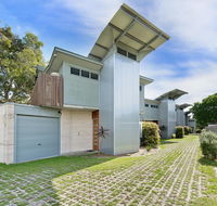Sun Worship Eco Villas - QLD Tourism