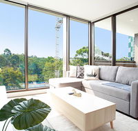 Designer Apartment with Balcony in Quiet Suburb - QLD Tourism
