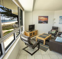 Oceanside Resort - Absolute Beachfront Apartments - QLD Tourism