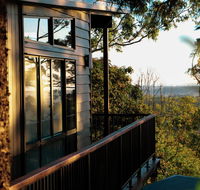 Rainforest Gardens - Luxury Hillside Chalets with Views to Bay  Islands - QLD Tourism