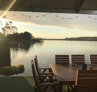 Shack built over the Murray River - Queensland Tourism