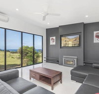 Skenes Retreat - views of the ocean from the deck - QLD Tourism