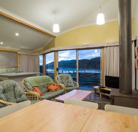 Arthur Riverfront and Sea Lodge downstream - QLD Tourism