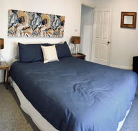 The Light and Bright Yellow Beach House - Queensland Tourism